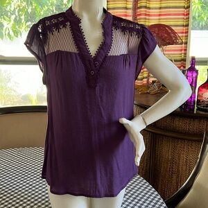 Purple top.  Size L